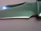 SOG Tomcat Cocobolo left edge blade